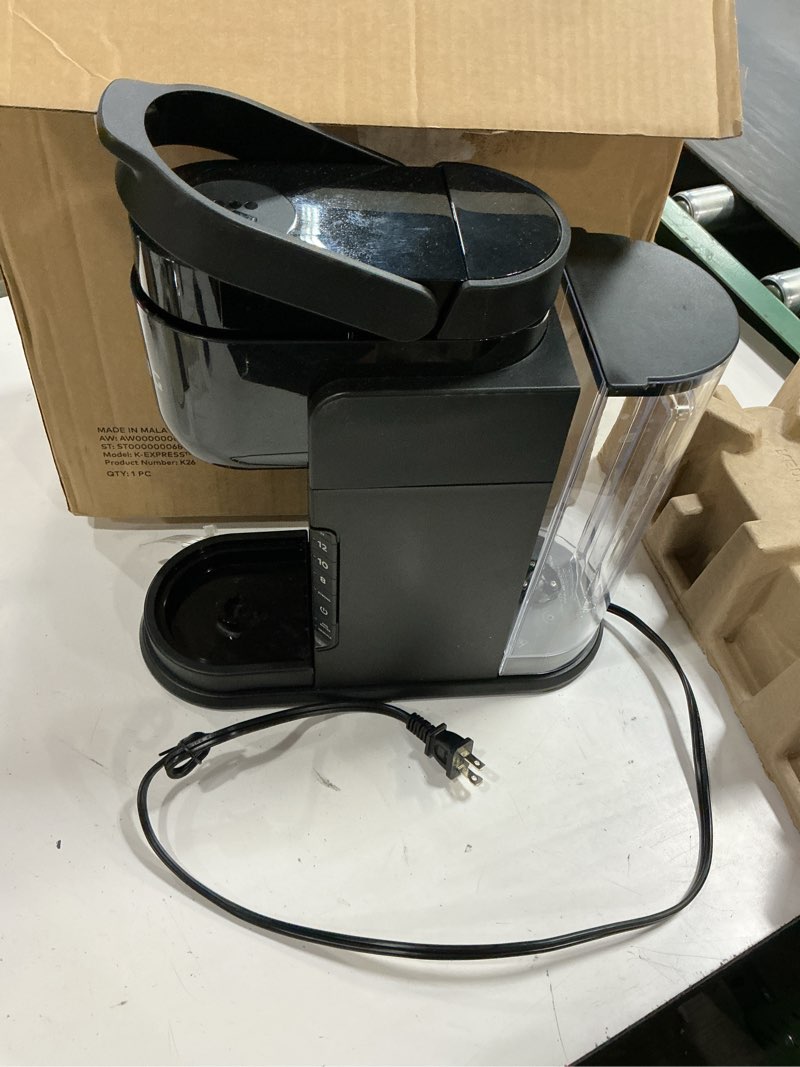 Condition photo showing As Is for keurig k-express single serve k-cup pod coffee maker, 3 brew sizes, strong button feature, 42oz removable reservoir, black