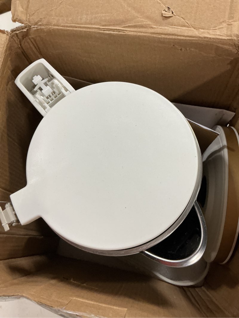 Condition photo showing As Is for west bend timeless electric kettle cordless serving features stainless steel interior boil dry protection and auto shut off, 1.5-liter, white/gold