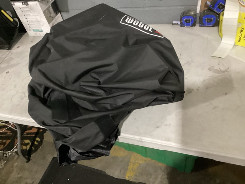 Condition photo showing As Is for weber grill cover