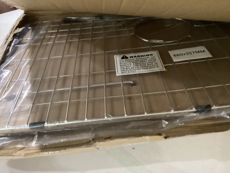 Condition photo showing Good Condition for sink grid 26" x 14 1/16", kitchen sink grid, sink protectors for kitchen sinks, stainless steel material, sink bottom grid with rear drain for single bowl (26" x 14 1/16") 26" x 14 1/16" with rear drain