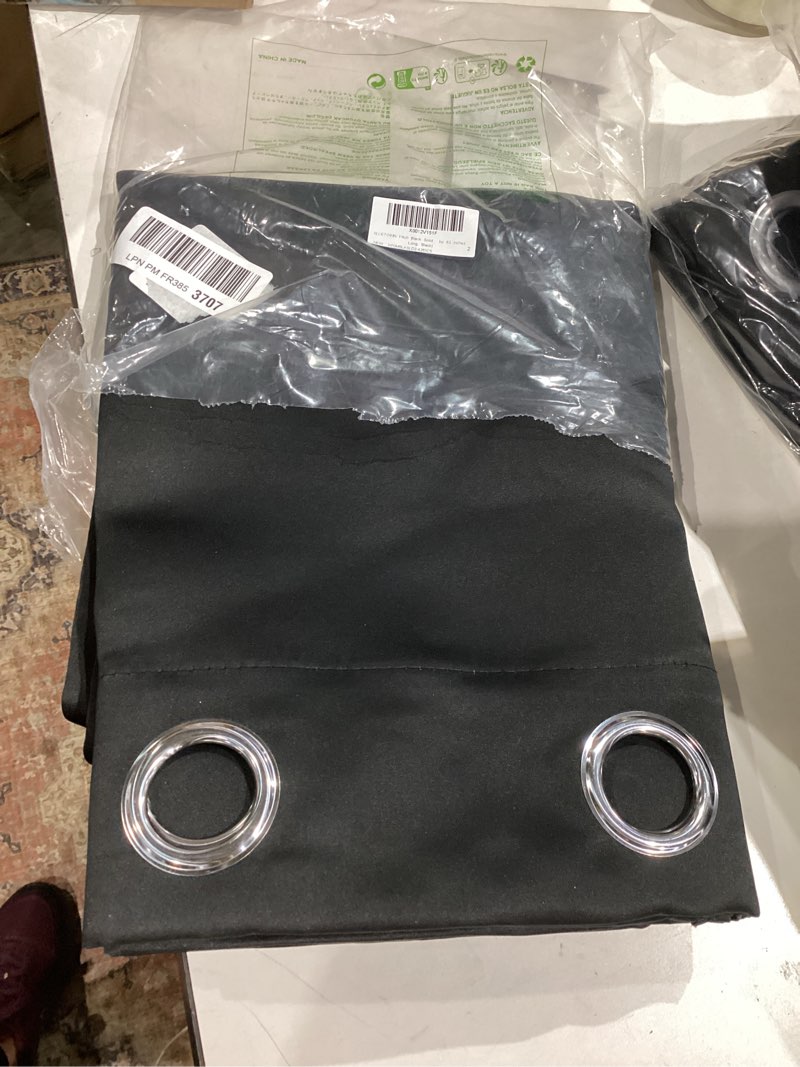 Condition photo showing Good Condition for nicetown pitch black solid thermal insulated grommet blackout curtains/drapes for bedroom window (2 panels, 42 inches wide by 63 inches long, black) black 42"w x 63"l (pack of 2)