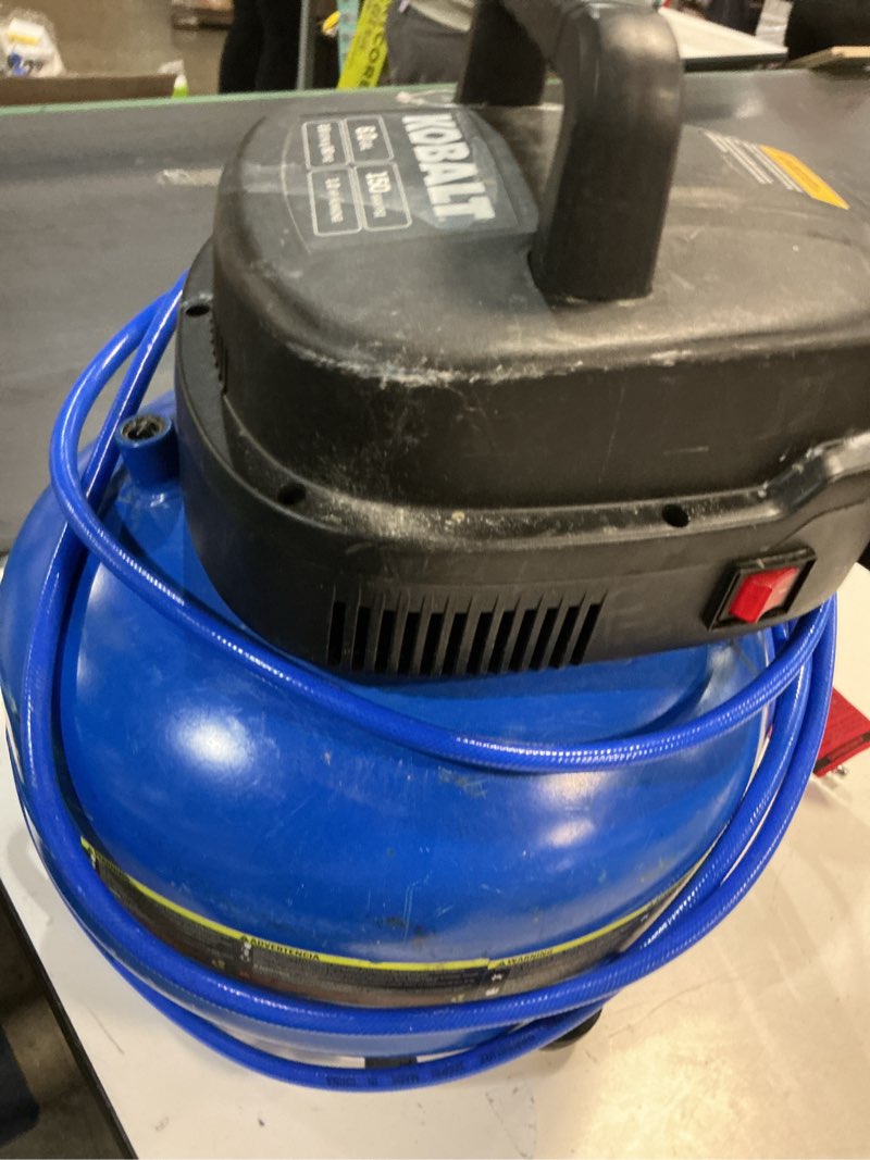 Condition photo showing As Is for Kobalt 6-Gallon Portable Electric 150 PSI Pancake Air Compressor with