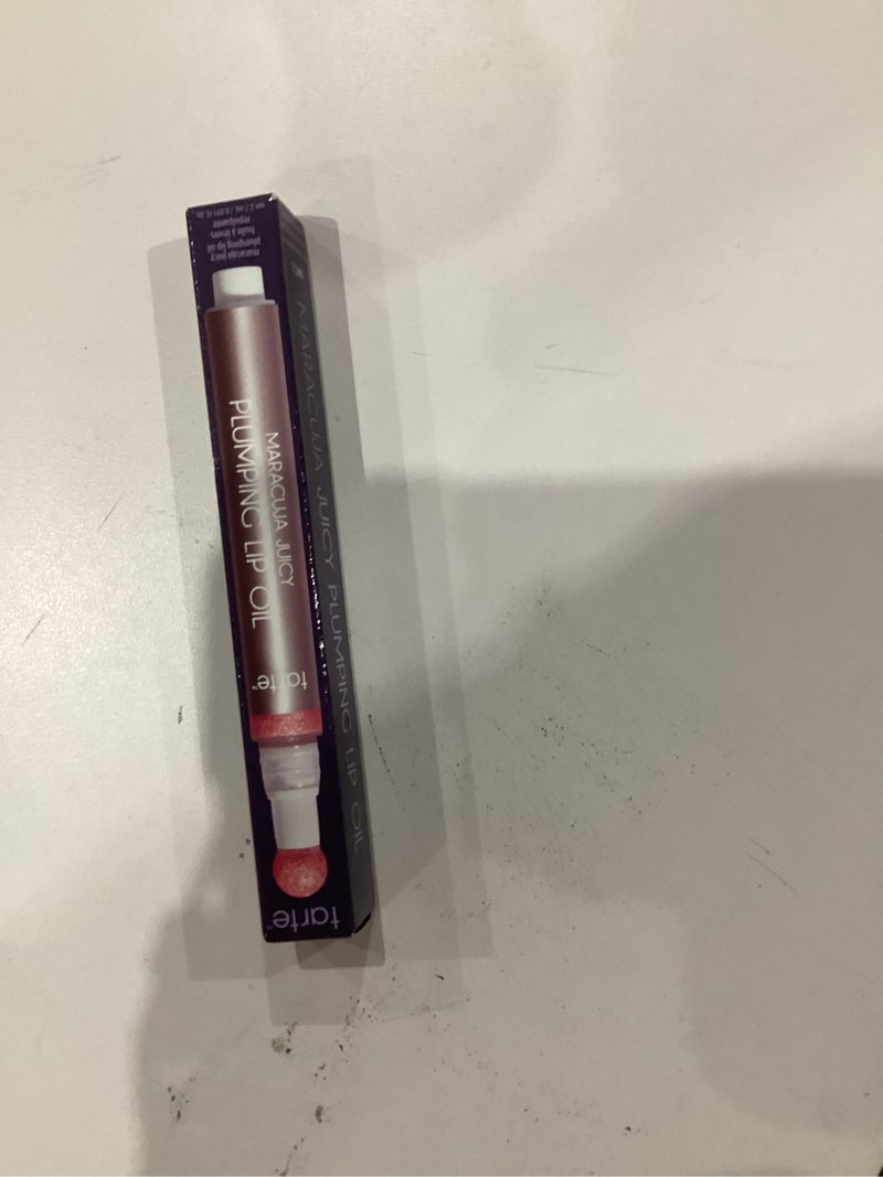 Condition photo showing New/Like New for tarte maracuja juicy plumping lip oil shimmering rose - shimmering soft pink beige