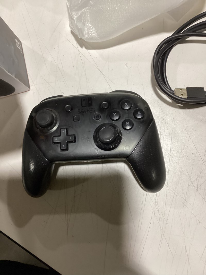 Condition photo showing Good Condition for Nintendo Switch Pro Controller Black Black