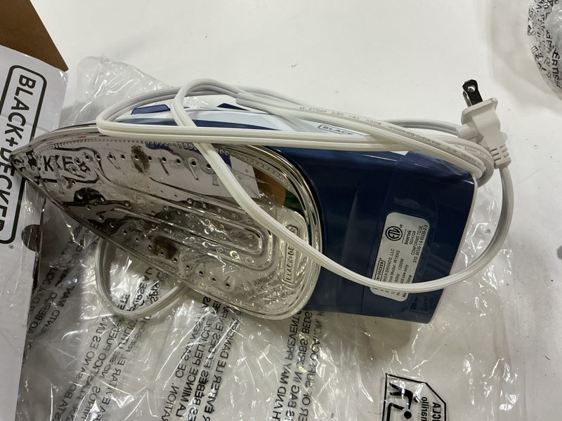 Condition photo showing As Is for black+decker™ one step steam iron  ir18xs-t