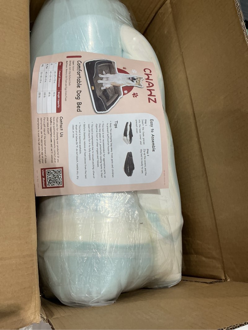 The Chawz Comfortable Dog Bed features a velvet upper, Oxford cloth bottom, and a mattress made of memory gel foam and egg crate foam. 