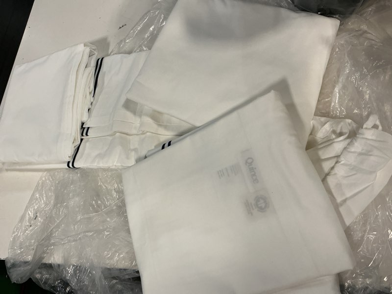 Condition photo showing As Is for quince organic crisp percale embellished deluxe bedding bundle, king, white/navy,(incomplete, set of 3)