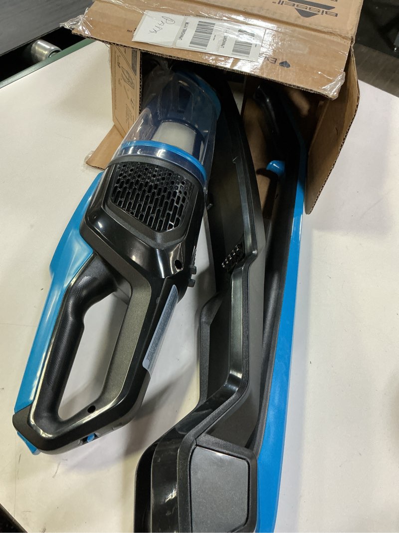 Condition photo showing As Is for Bissell, 3061 Featherweight Cordless Stick Vacuum, Self-Standing, Electric Blue, Black