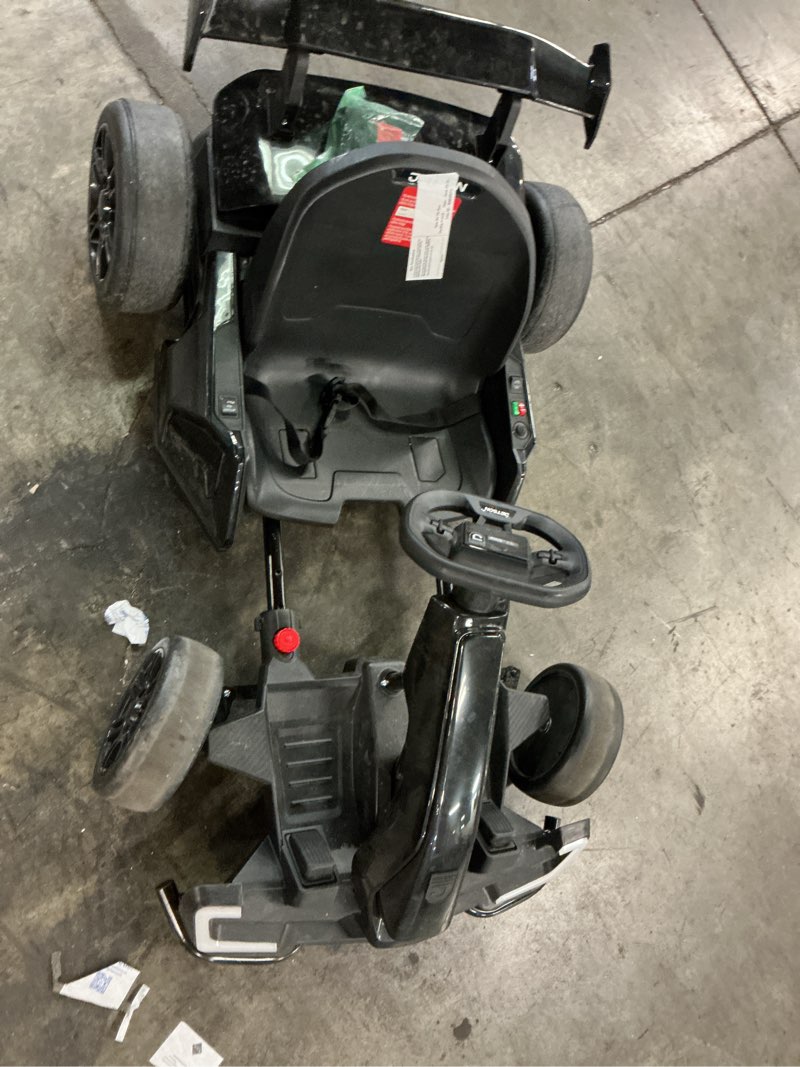 Condition photo showing As Is for vibespark 24v 7ah electric go kart for big kids, up to 8.5 mph drift go kart car with adjustable seat, 2*150w powered ride on car, drift/sport modes, bluetooth, black