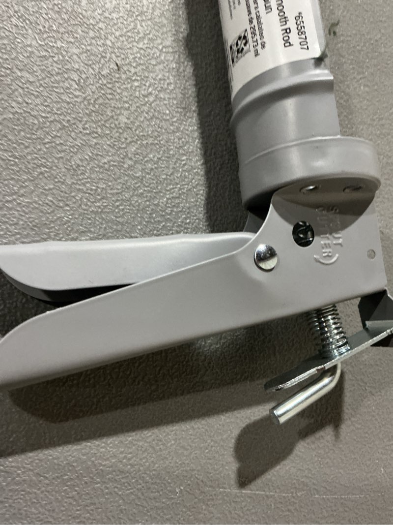 Condition photo showing As Is for project source 10 -oz smooth rod caulk gun