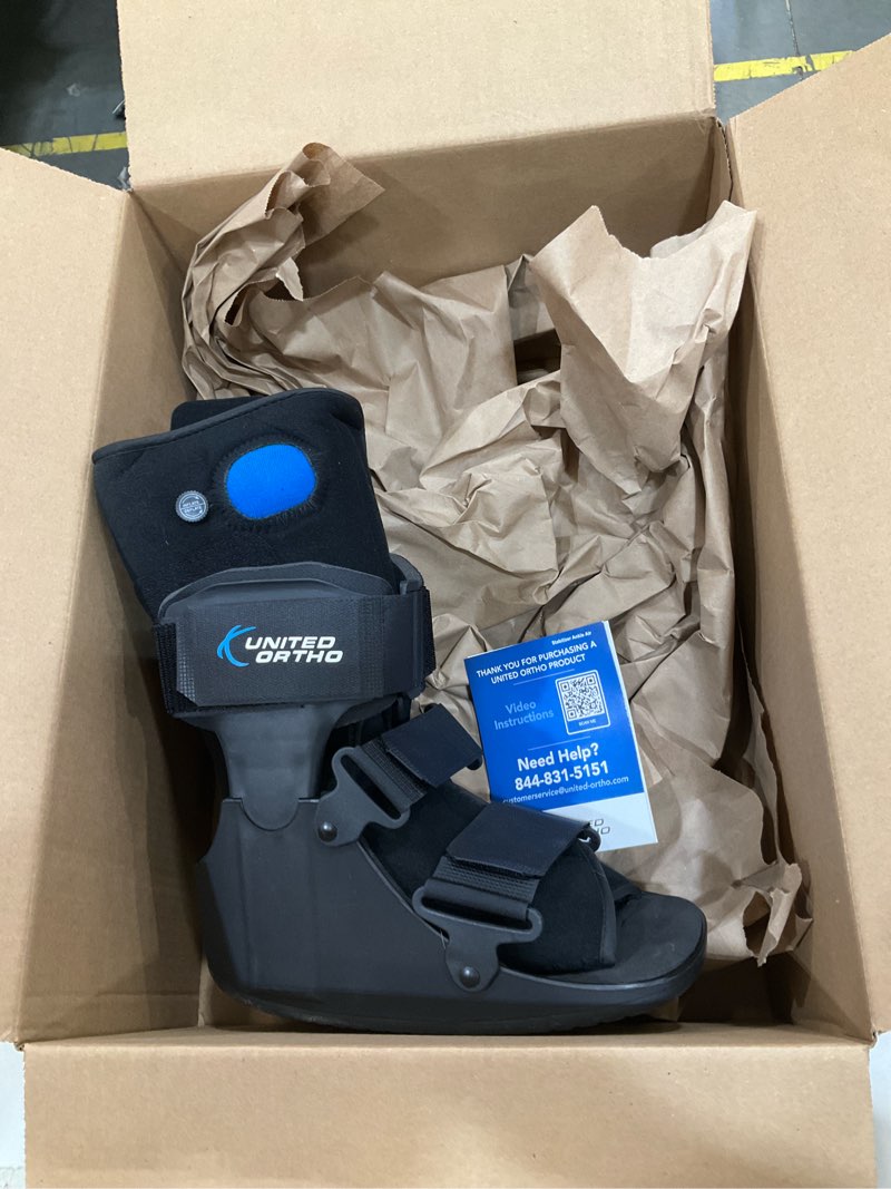 Condition photo showing Good Condition for united ortho short air cam walker fracture boot, small, black black small boot