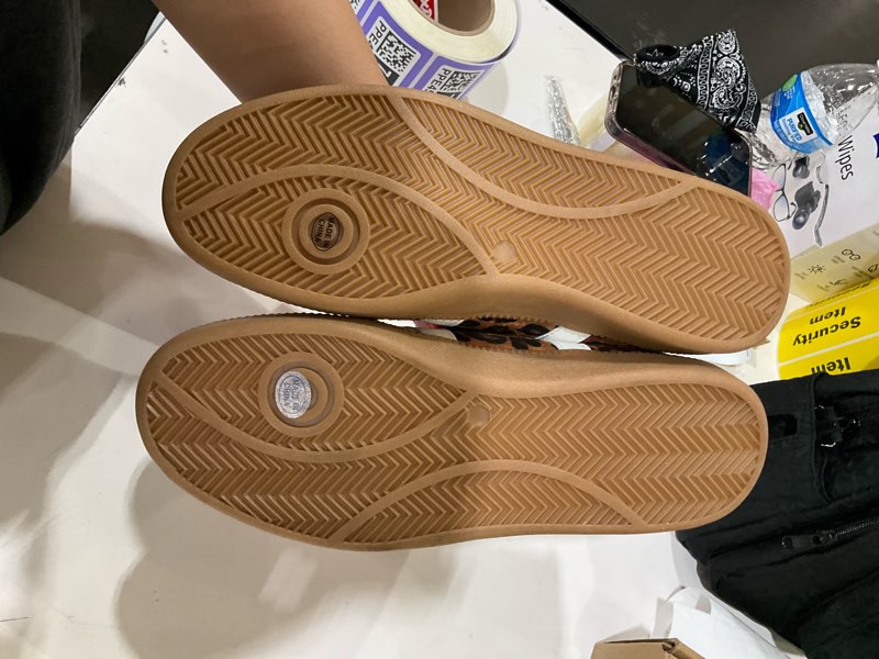 Condition photo showing As Is for 9.5 shoes