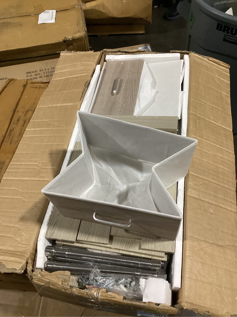 Condition photo showing As Is for unknown brand similar to stock photo possibly missing hardware.. foldable felt drawers cabinet with metal legs