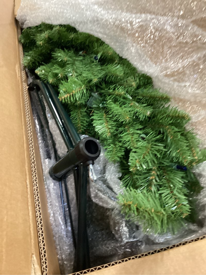 Condition photo showing Good Condition for National Tree Company 6.5 ft Pre-Lit Kingswood Fir Slim Artificial Christmas Tree, 250 Multicolor Lights, 719 Tips, Includes Stand, Green 6.5 Feet Christmas Tree