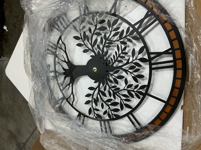 Condition photo showing As Is for large wall clock for living room decor 22 inch tree of life metal wall art, non-ticking battery operated metal black with solid wood frame for office/bedroom/kitchen/dining room roman numeral 22"w x 22"h