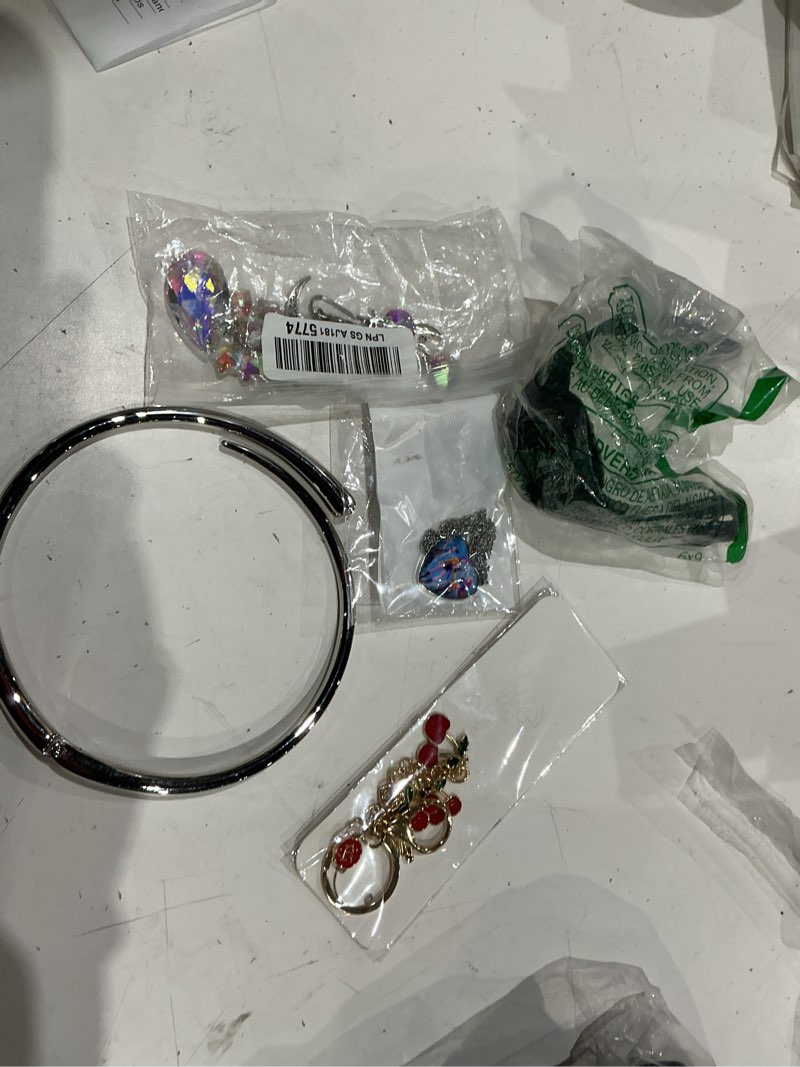Condition photo showing As Is for assorted men’s and women’s fashion jewelry (watches, necklaces, bracelets, earrings, etc.)