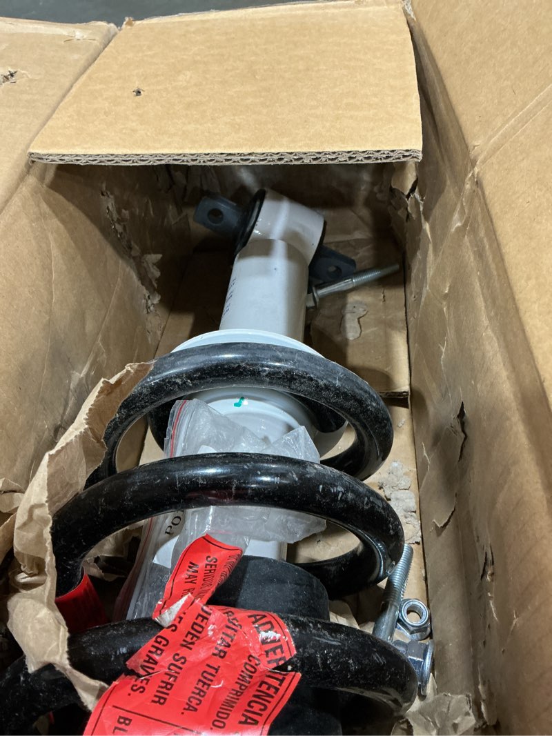 Condition photo showing As Is for rancho rs5000x loaded rs551830 suspension strut and coil spring assembly