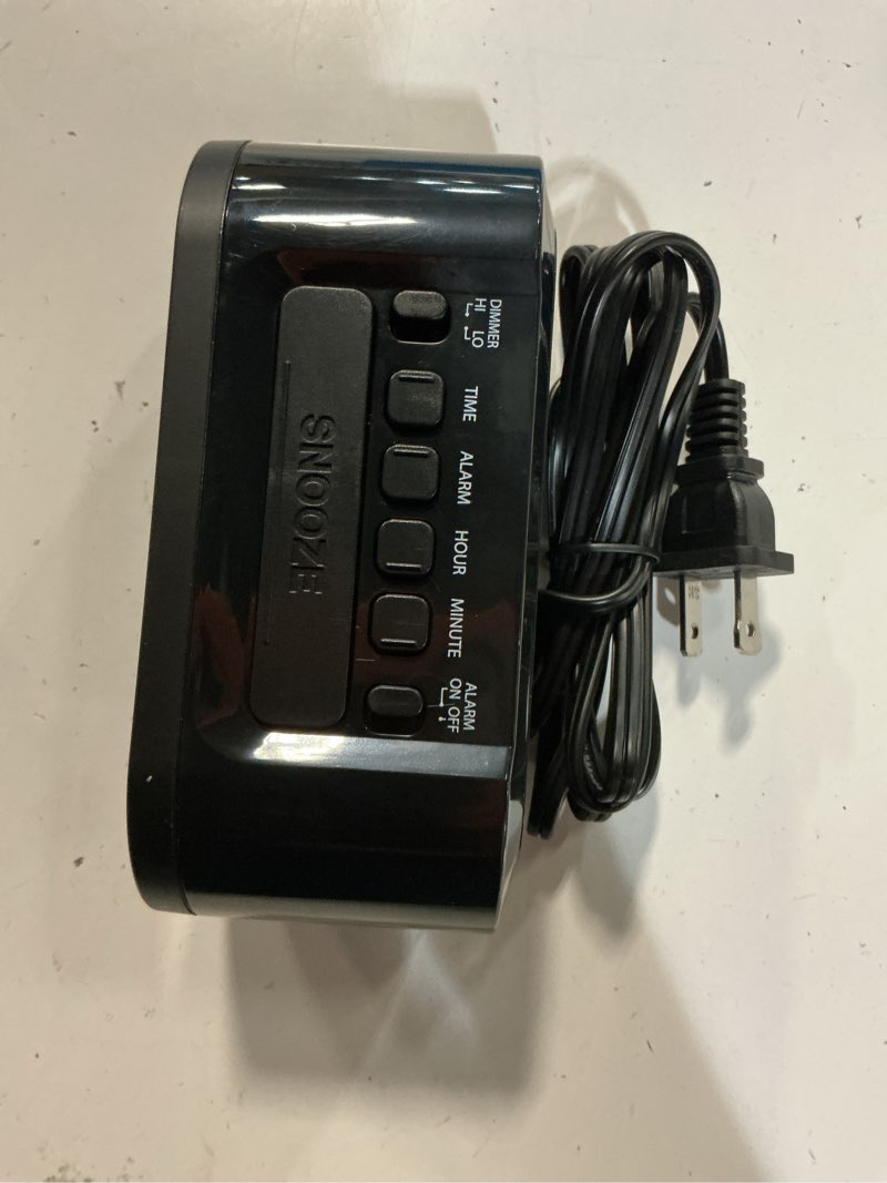 Condition photo showing As Is for sharp digital alarm clock with accuset - automatic set, black with white led display
