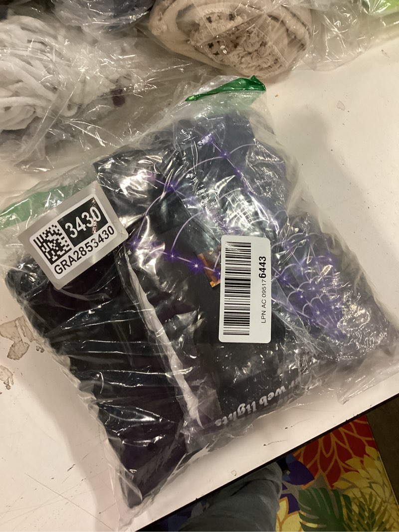 Condition photo showing New/Like New for Spider Web Halloween Decorations Outdoor Lights, 125 Purple LED Light Up 16.4Ft Giant Spiderweb & 60" Large Spider & 22 Small Spiders & 20g Stretch Cobweb, 8 Modes Lighted Decor for Yard Outside Battery powered + remote control