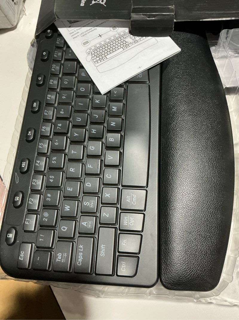 Condition photo showing As Is for SABLUTE Ergonomic Wireless Keyboard and Mouse Combo - Wave Keyboard with Soft Leather Wrist Rest, Resistant Keys, RGB Backlit Rechargeable Set for PC/Mac/Chromebook (Black)