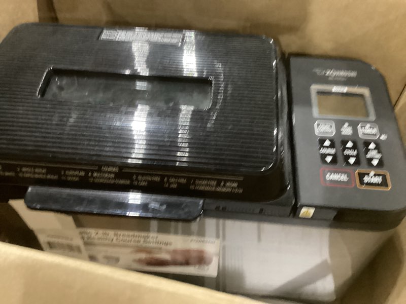 Condition photo showing Good Condition for used zojirushi bb-pdc20ba home bakery virtuoso plus breadmaker, 2 lb. loaf of bread