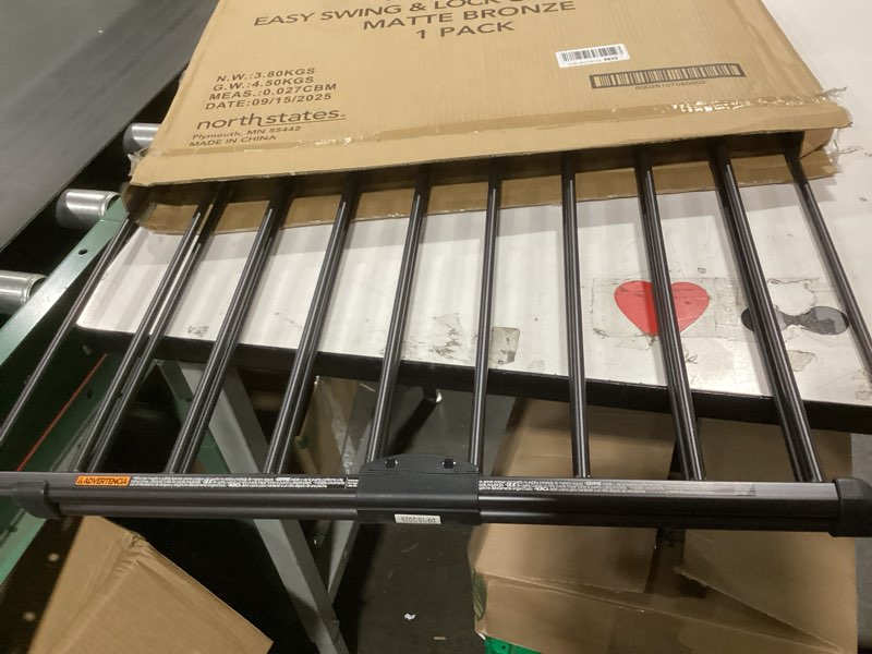 Condition photo showing Good Condition for toddleroo by north states - easy swing & lock baby gate series 2: metal safety for stairs & doorways - adjustable 28.68 to 47.85 inches wide - 31 inches tall - matte bronze