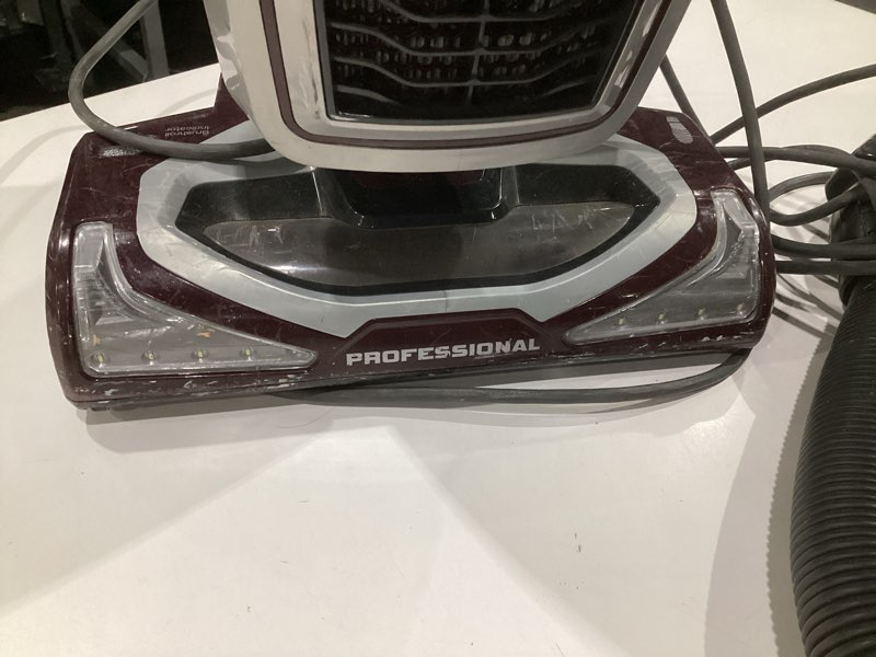 Condition photo showing As Is for (used, damaged)shark nv752 rotator powered lift-away truepet upright vacuum with hepa filter, large dust cup capacity, led headlights, upholstery tool, perfect pet power brush & crevice tool, bordeaux