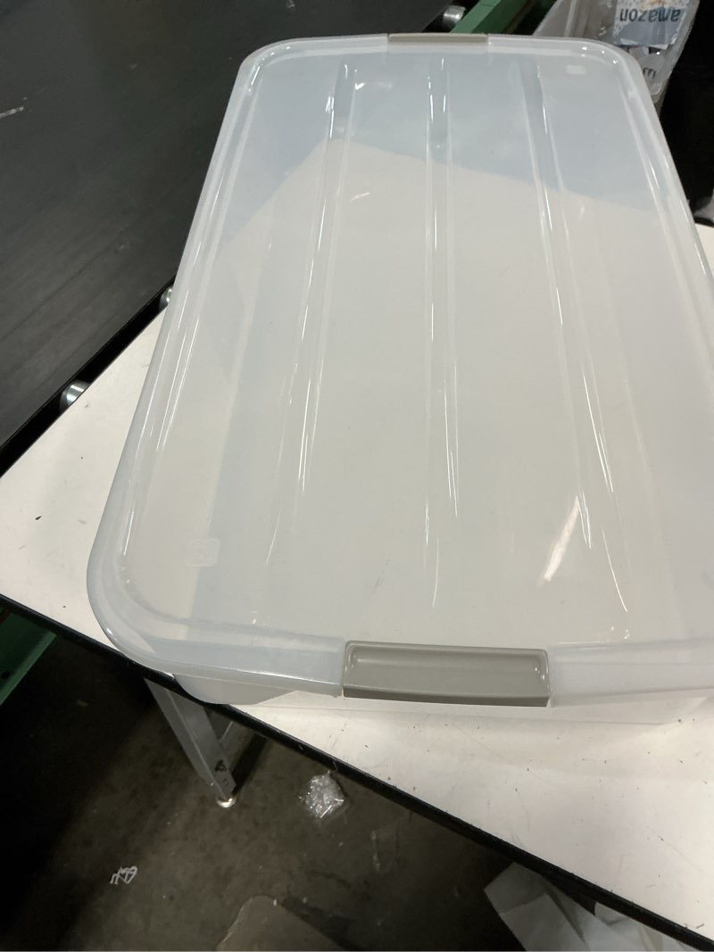 Condition photo showing Good Condition for iris usa 50 qt plastic under bed storage organizer bin container with secure lids and durable black buckles, multi-purpose for clothes shoes clothing bedding, long, clear 50 qt.- single;