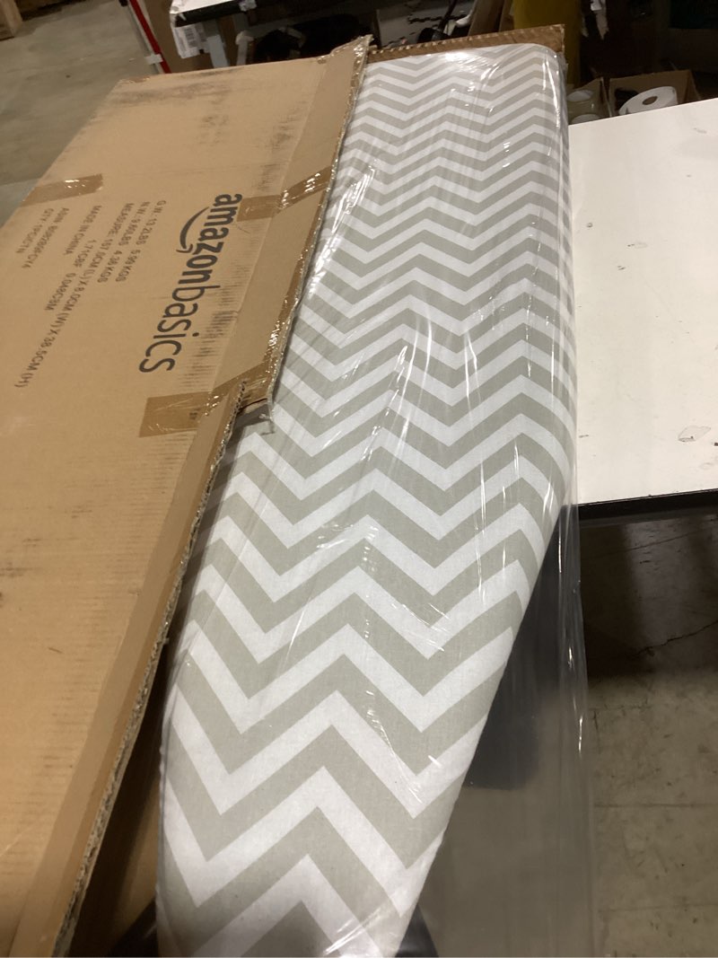 Condition photo showing New/Like New for amazon basics full-size ironing board - 4-leg fold-up, chevron removable cover, 60"l x 14"w x 38"h