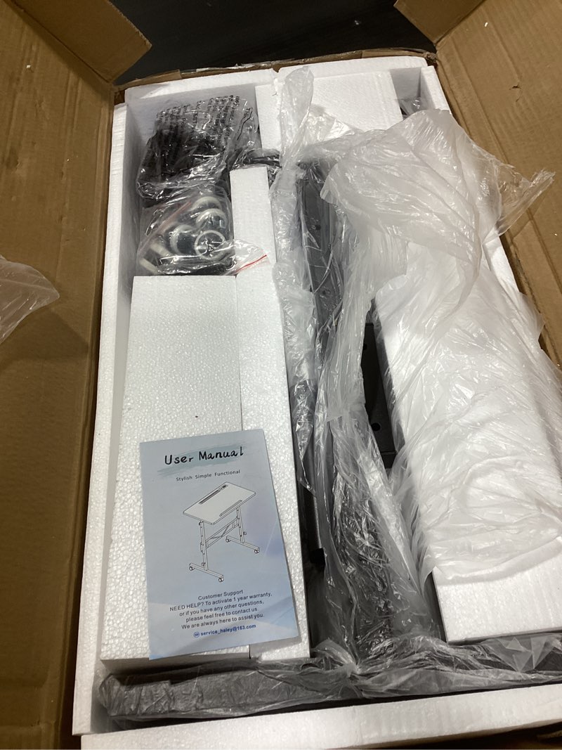 Condition photo showing Good Condition for siducal standing desk height adjustable with tiltable tabletop, black upgraded black