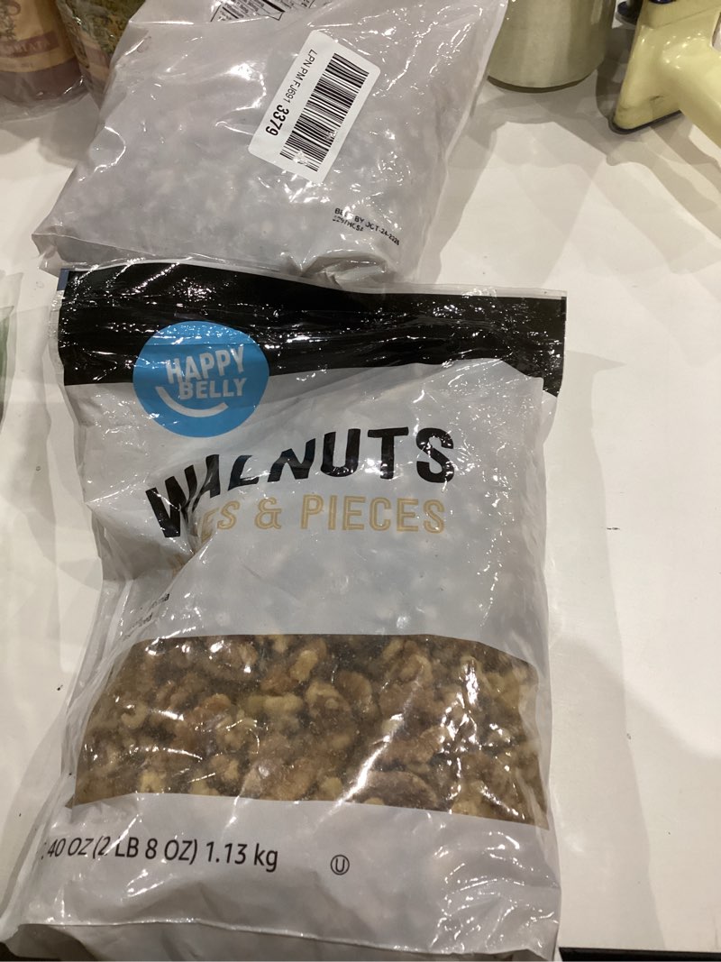Condition photo showing Good Condition for Amazon Brand - Happy Belly California Walnuts Halves and Pieces, 40 ounce Walnuts Halves and Pieces 40 ounce