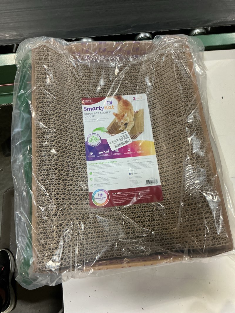 Condition photo showing New/Like New for smartykat super scratcher chaise corrugate cat scratcher and lounge, cradling chaise shape for scratching & comfort one size super scratcher chaise