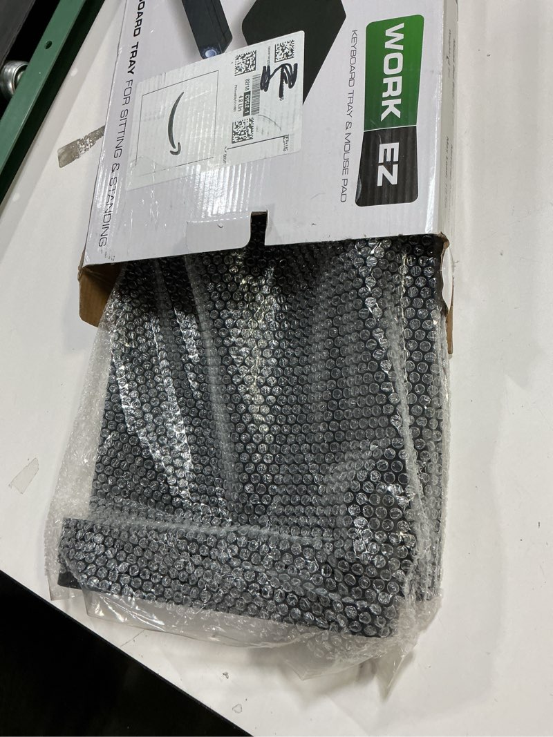 Condition photo showing New/Like New for Uncaged Ergonomics WorkEZ Adjustable Computer Keyboard Stand for Desk, Keyboard & Mouse Riser, Ergonomic Portable Stand for Desktop, Computer Keypad Riser for Desk Black