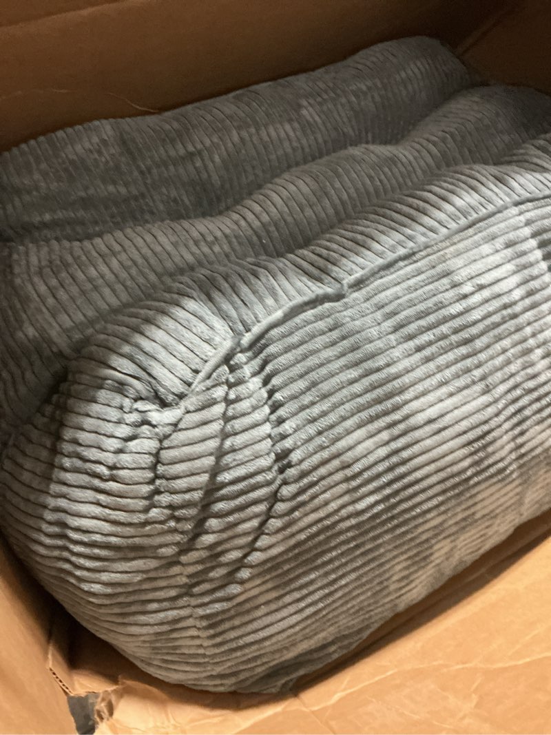 Condition photo showing As Is for HIGOGOGO Square Stuffed Pouf Ottoman, Corduroy Poufs with Foam Chunk Filling, Furry and Fluffy Pouf Foot Stool Storage Ottoman, 25.6 X 25.6 Floor Poufs Foot Rest for Living Room, Dark Grey 25.5 Inch Dark Grey