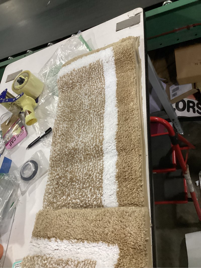 Condition photo showing Good Condition for olanly bathroom rugs 44x24, extra soft and absorbent microfiber bath mat, non-slip, machine washable, quick dry shaggy bath carpet, suitable for bathroom floor, tub, shower (runner, beige) 44" x 24" beige and white