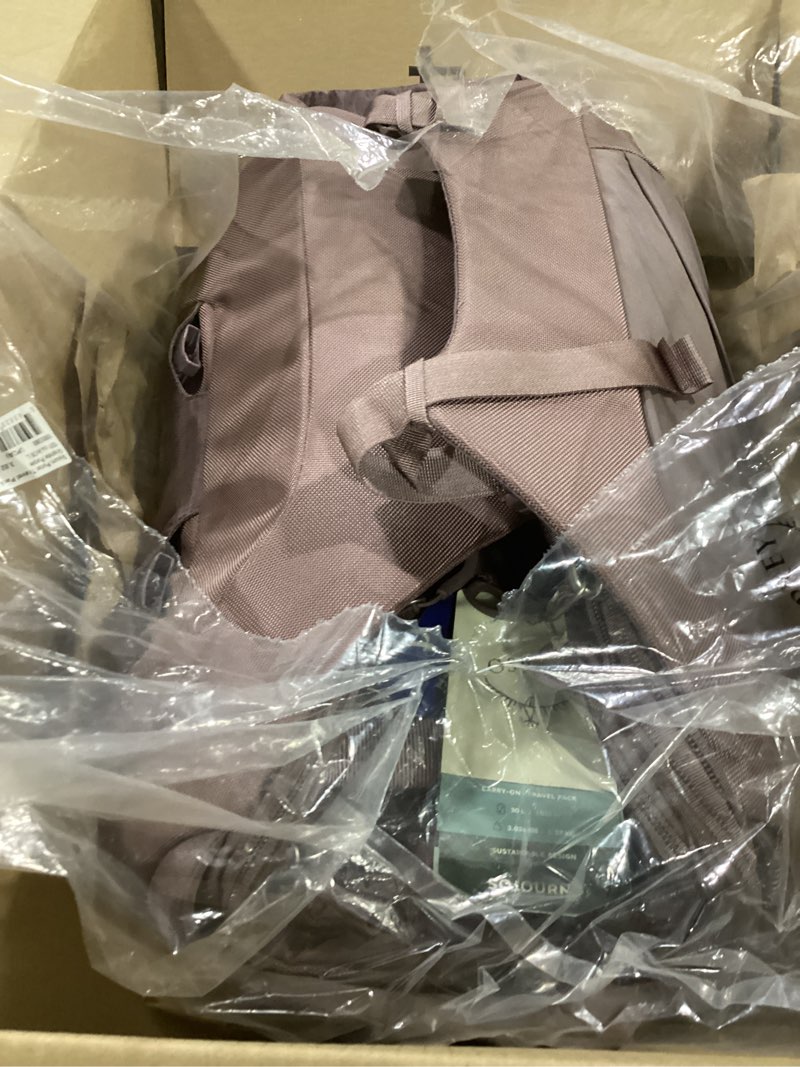 Condition photo showing As Is for osprey sojourn porter 30l travel backpack - carry-on compliant luggage with straightjacket compression and padded laptop sleeve - durable pack for international or urban travel, graphite purple 30l graphite purple