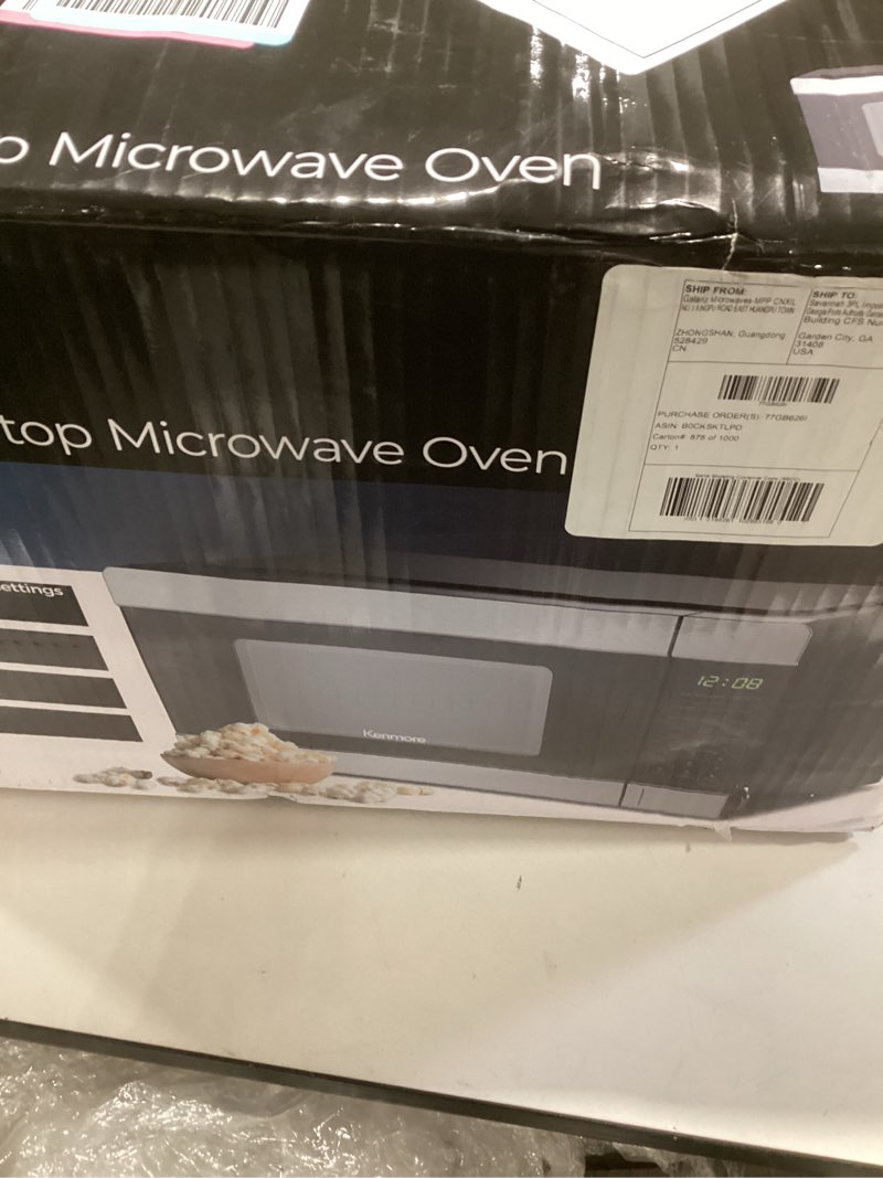 Condition photo showing New/Like New for Kenmore Countertop Microwave, 6 Auto-Preset Menus, Child Lock, Defrost & Express Cooking Features, 900 Watt, .9 Cu Ft, Stainless Steel Stainless Steel 0.9 Cu Ft