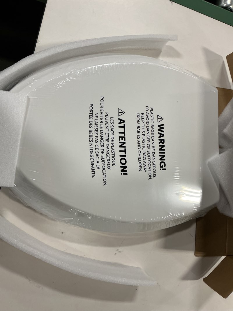 Condition photo showing New/Like New for Quick Flip Elongated Toilet Seat with Built-In Potty & Splash Guard for Toddler Training, Slow Close - Jool Baby