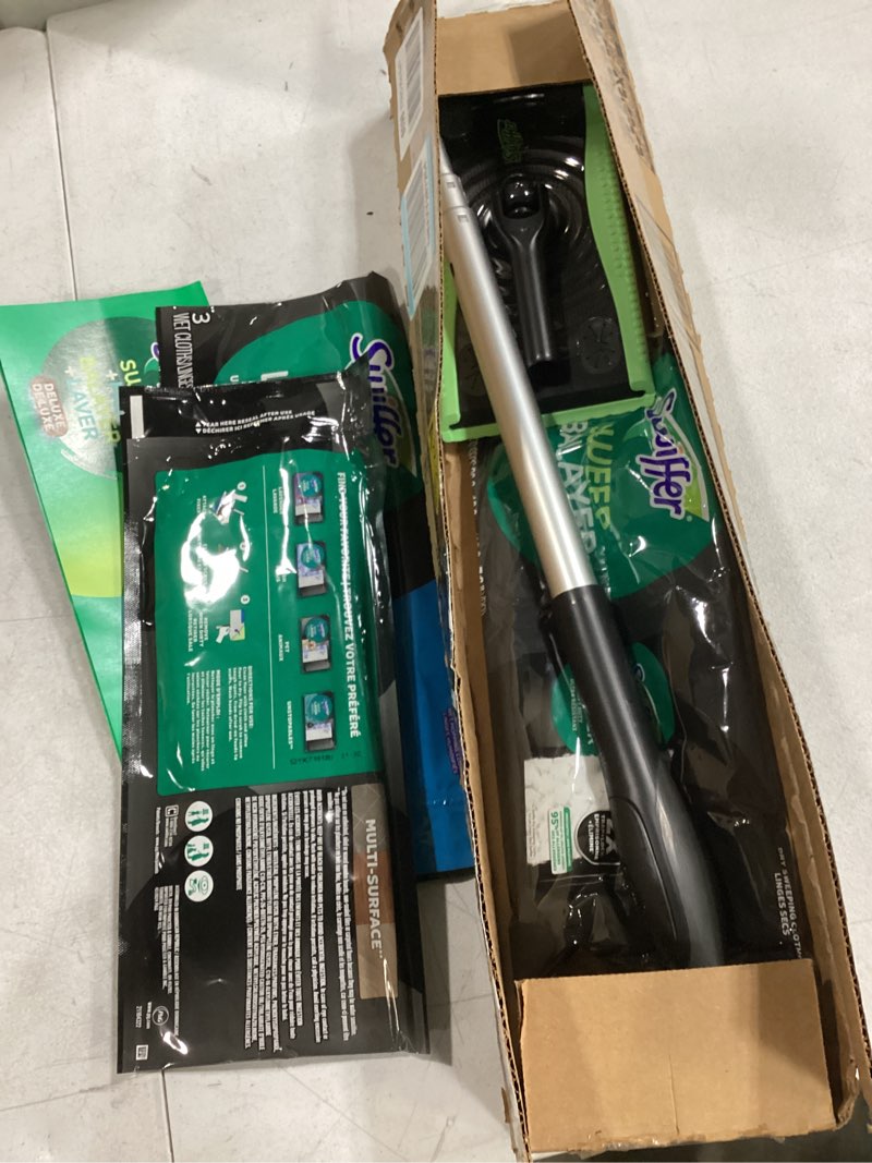 Condition photo showing New/Like New for swiffer sweep & mop deluxe 2-in-1 multi-surface kit for floor cleaning, includes 1 sweeper device, 5 dry sweeping + 6 wet mopping heavy duty cloths, black