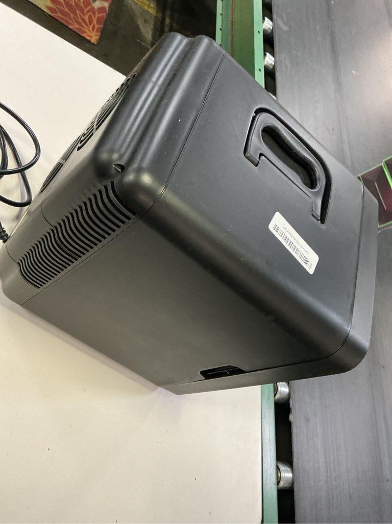 Condition photo showing As Is for frigidaire portable 10l, 15-can mini fridge brushed stainless rugged refrigerator, efmis188-ss