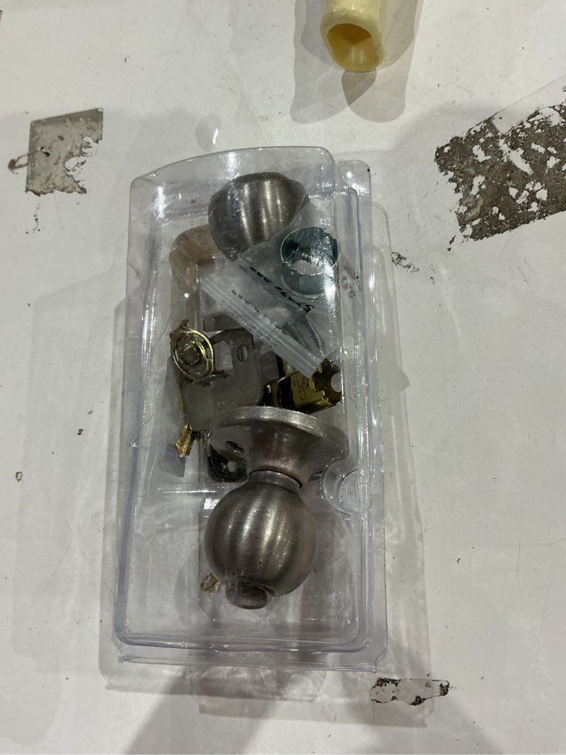 Condition photo showing As Is for kwikset polo satin nickel entry door knob 1-3/4 in.