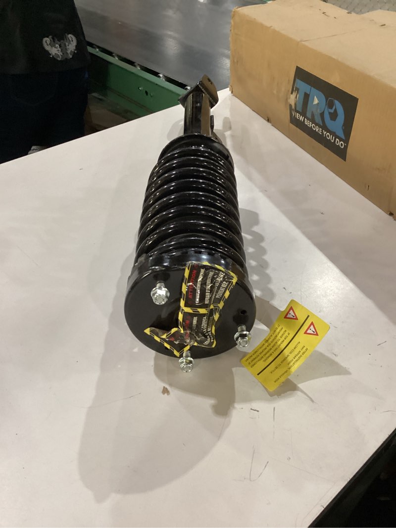 Condition photo showing New/Like New for TRQ Front Left Strut and Spring Assembly Compatible with 2005-2010 Chrysler 300