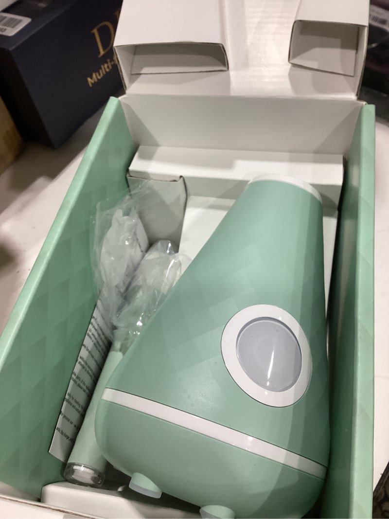 Condition photo showing As Is for tao clean uv sanitizing sonic toothbrush and cleaning station, electric toothbrush, dual speed setting, seaglass green