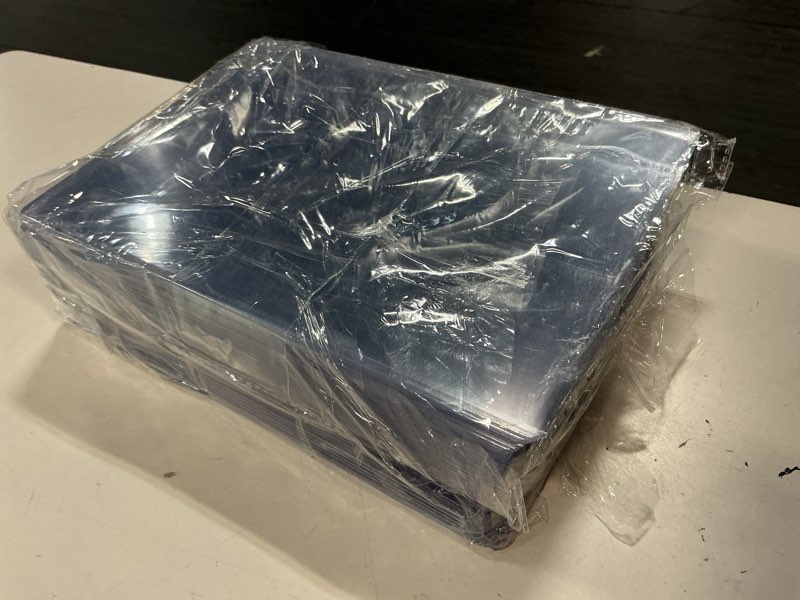 Condition photo showing As Is for sinjeun 50 pack 6" x 8" rigid print protectors, clear top loading photo sleeves, hard plastic sheet protector for photos album paper postcard document, no holes