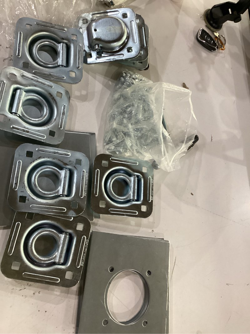 Condition photo showing As Is for 8 pack recessed d-ring tie down anchors with washers and mounting hardware (6000lb capacity) suitable for heavy duty floor rope anchor tie down kit for trailer cargo truck flatbed pickup or deliveries