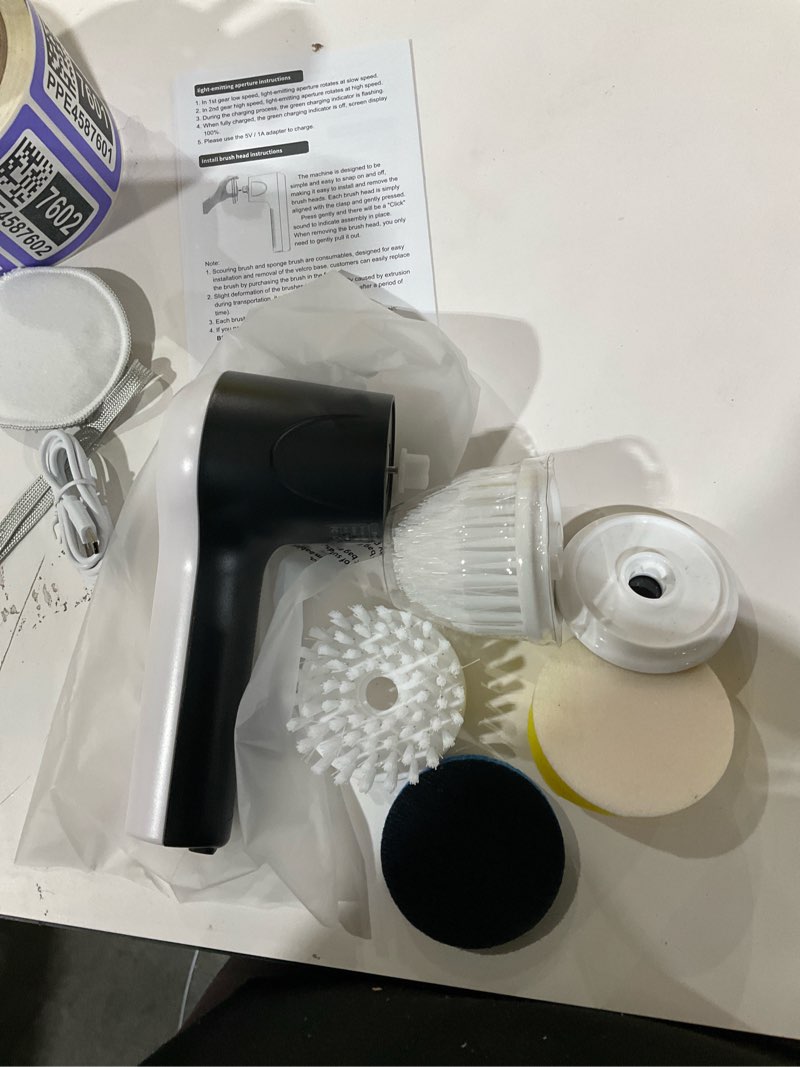 Condition photo showing As Is for Electric Spin Scrubber, Cordless Shower Scrubber with Battery Level Display, 2 Speeds Electric Scrubber for Cleaning with 6 Replaceable Heads, Cleaning Brush for Bathroom/Sink/Window White