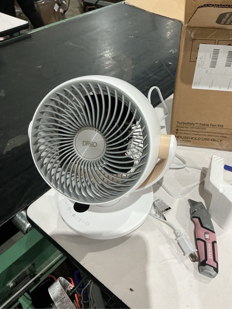 Condition photo showing As Is for dreo fan for bedroom, desk air circulator fans with remote, 11 inch table fan for whole room, 65ft powerful airflow, 120° vertical manual and 90° oscillating, 4 speeds, 8h timer, 25db quiet, home pury white