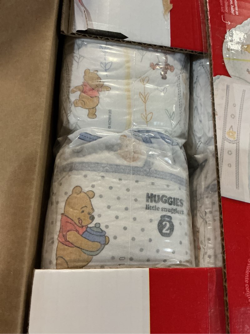 Condition photo showing New/Like New for Huggies Size 2 Diapers, Little Snugglers Baby Diapers, Size 2 (12-18 lbs), 84 Count, Packaging May Vary Size 2 84