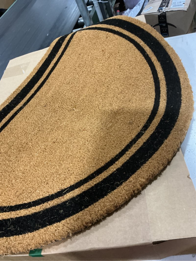 Condition photo showing As Is for calloway mills black doormat with half circle border 