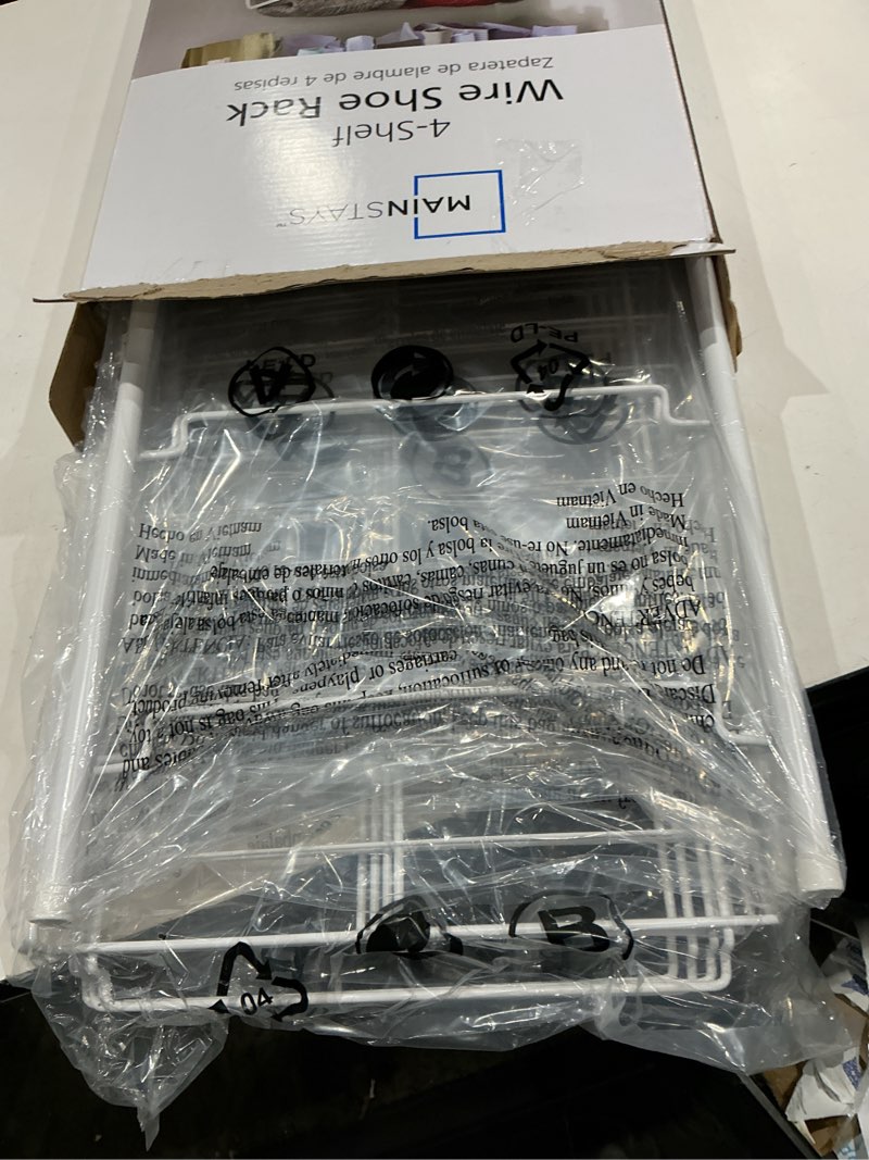 Condition photo showing Good Condition for mainstays 4-tier steel wire shoe organizer, holds up to 12 pairs, arctic white